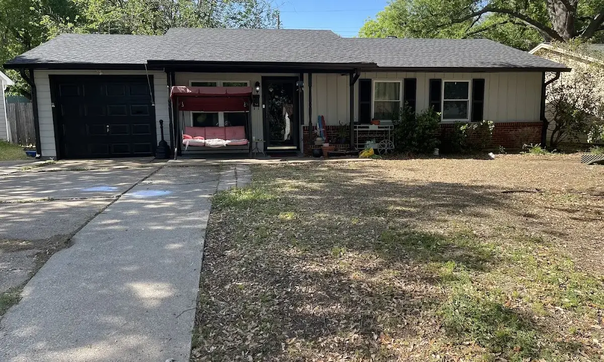 Asphalt Shingle Roof Repair crew at work on a residential roof in Finley